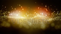 Cinematic golden glowing moving particles with floating lights. Magical dust with on clean background. Abstract motion of particles in 4K. Seamless loop.