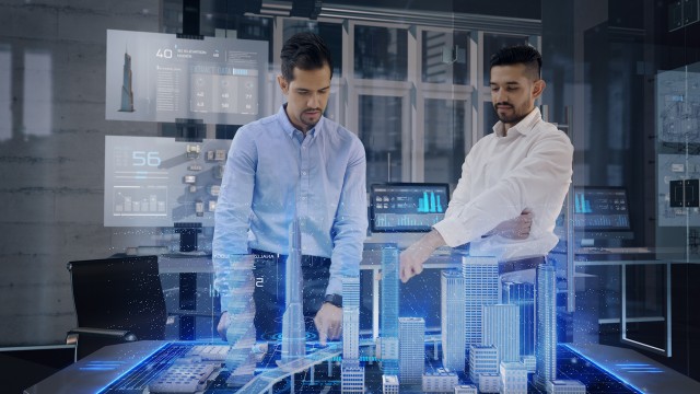 Professional Architects work with Holographic Augmented Reality 3D City Model using gestures. 