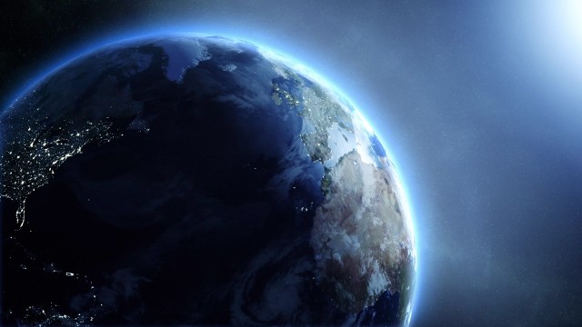 Blue Realistic Earth Spins in Outer Space
