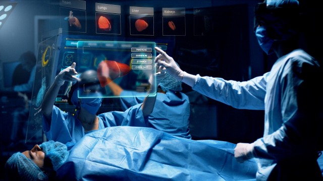 Doctor analyzing Liver 3D Scan on a futuristic augmented reality lens.