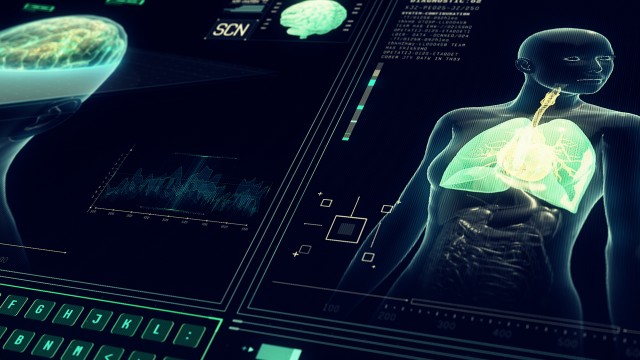 Interface Monitor Brain Scan showing human body and Neuronal Impulses with futuristic Infographics and Data on Screen. Brain Scan and Digitalization Technology.