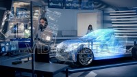 Engineers analyzing futuristic holographic car with digital screens.