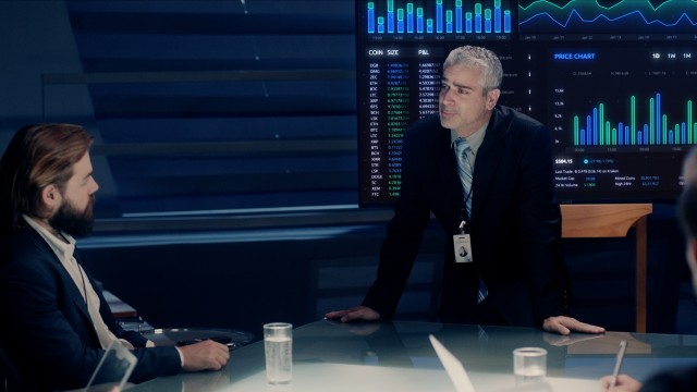 Corporate Meeting Room: Executive Director presents Exchange Trading Market Statistics and Financial Graphs to a Board of Executives. Shot on ARRI ALEXA Mini UHD Camera.